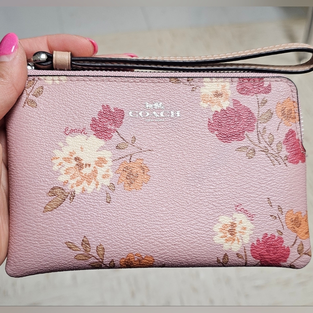 Coach pink floral corner zip wristlet
